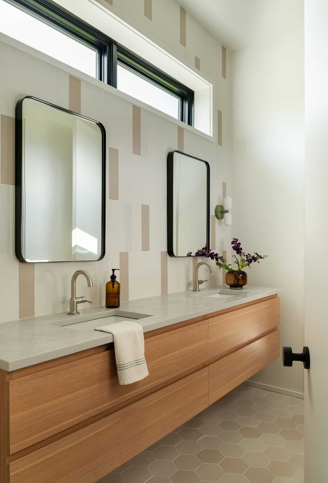 modern bathroom vanity with dual sinks and mirrors