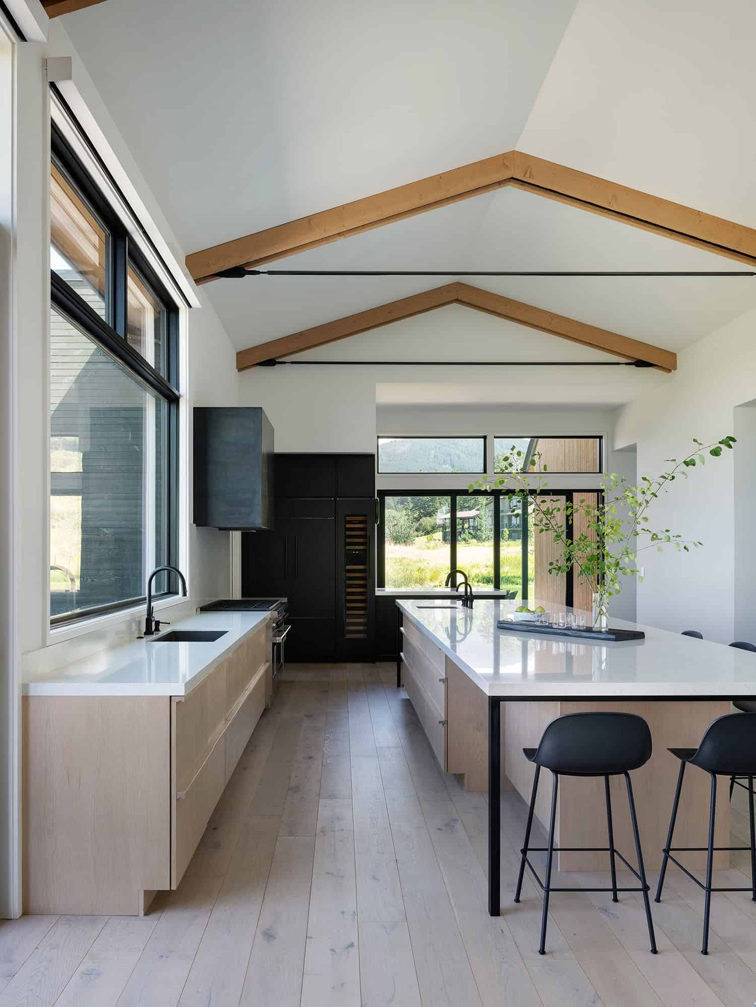 modern kitchen with a vaulted ceiling