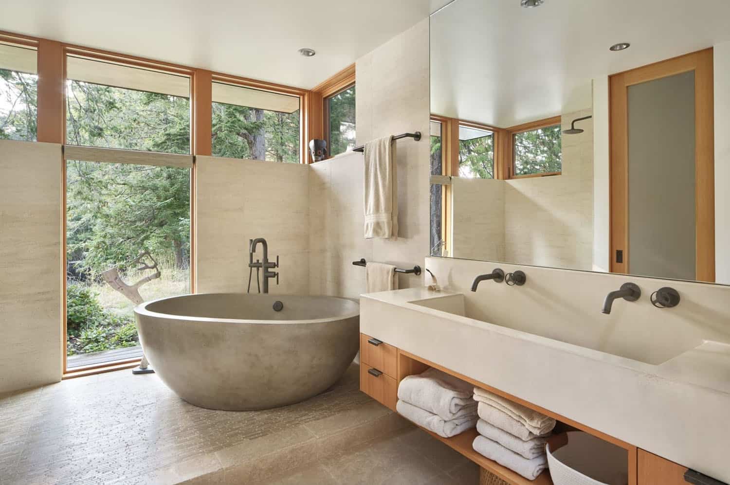 modern rustic bathroom with a vanity and soaking tub