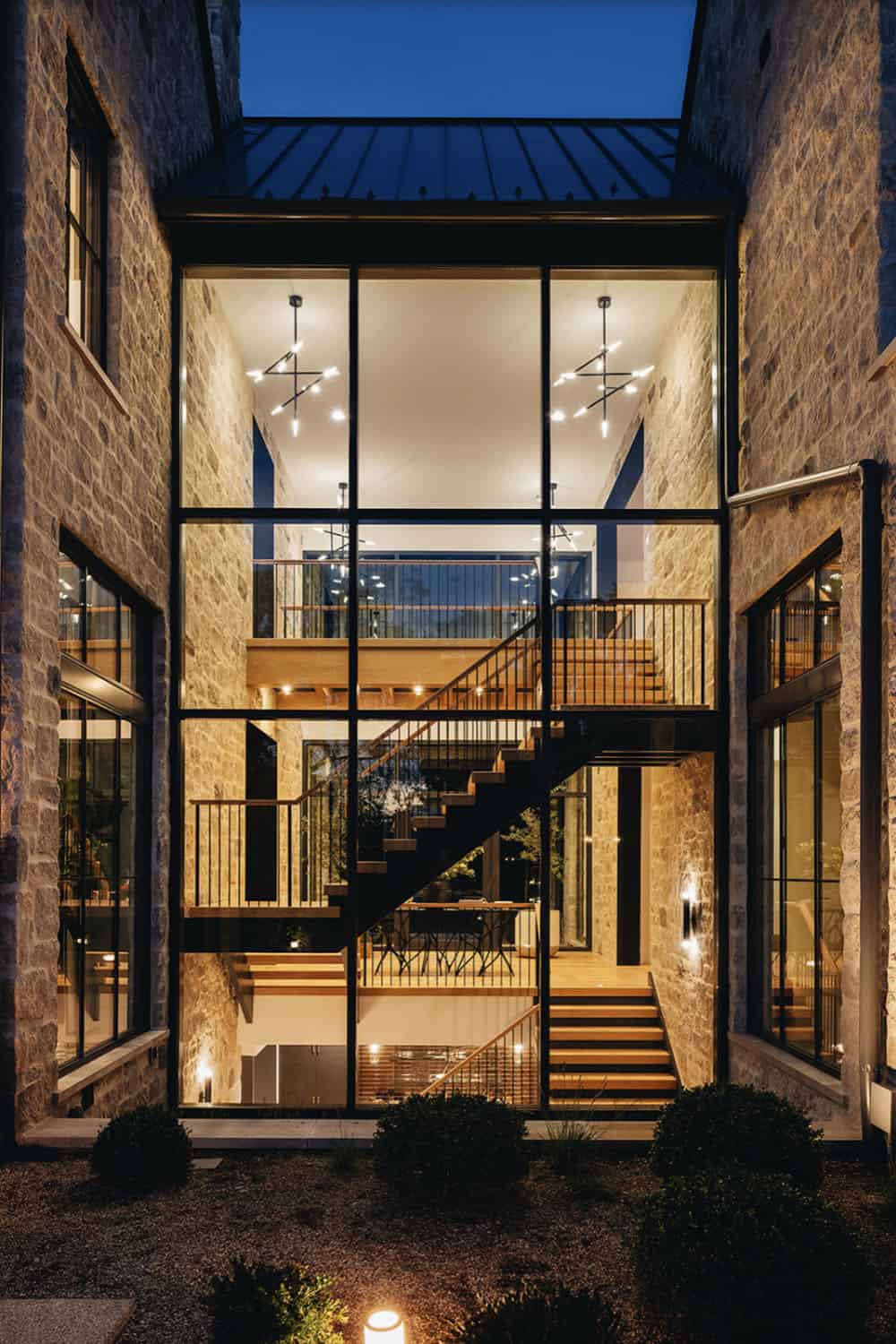 transitional home exterior at dusk