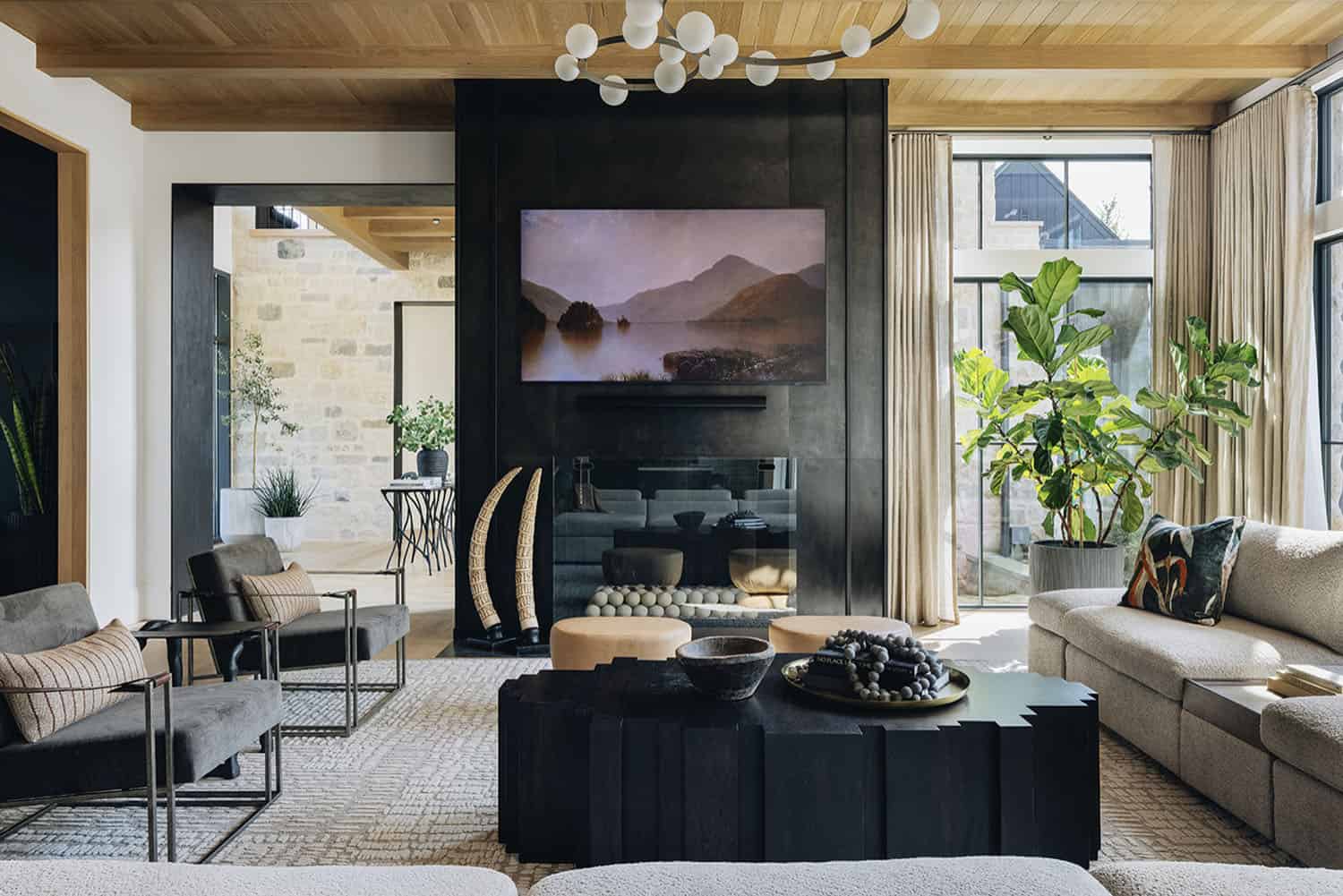 transitional living room with a fireplace