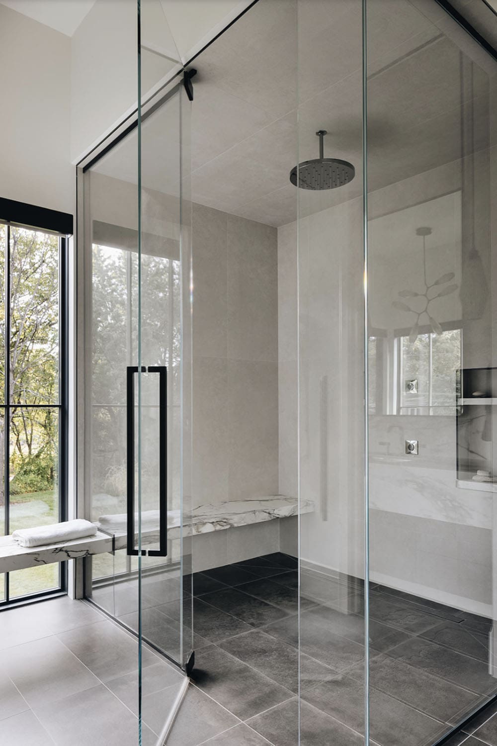 transitional bathroom with a walk-in shower