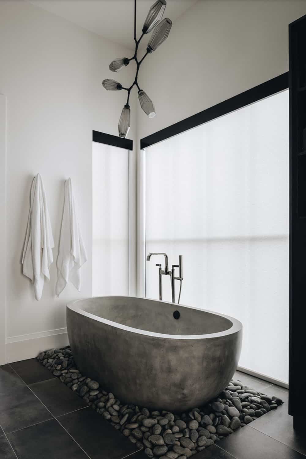 transitional bathroom with a freestanding tub