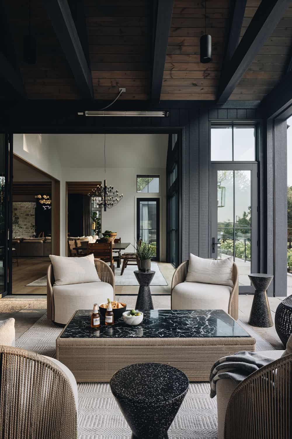 transitional covered porch with outdoor furniture