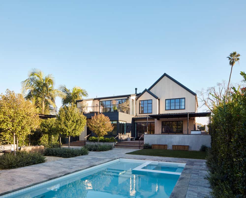 urban farmhouse exterior with a pool