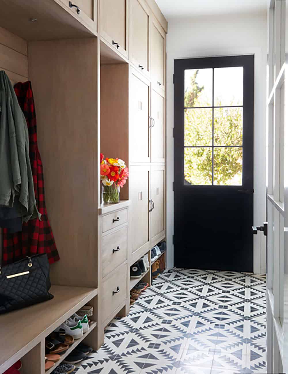 urban farmhouse mudroom with a built-in bench