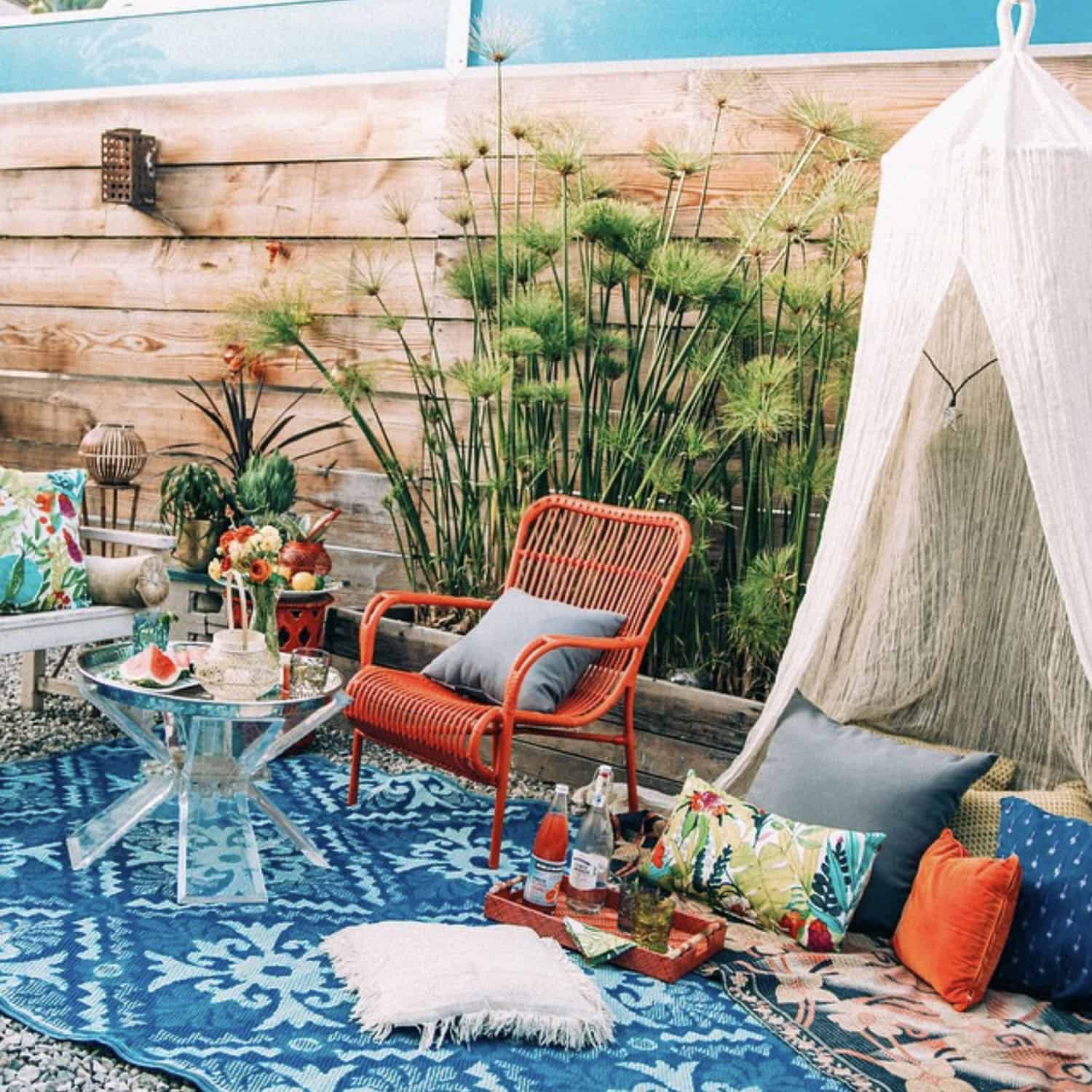 small patio with colorful outdoor furniture