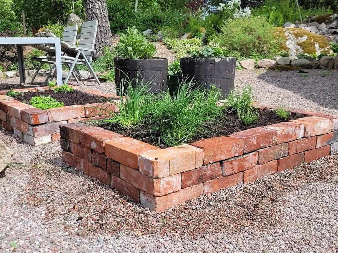 brick garden edging around a raised planter bed