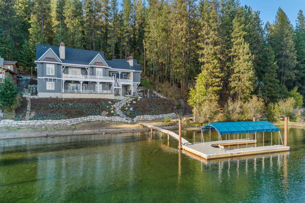 contemporary lake house exterior with a view of the water