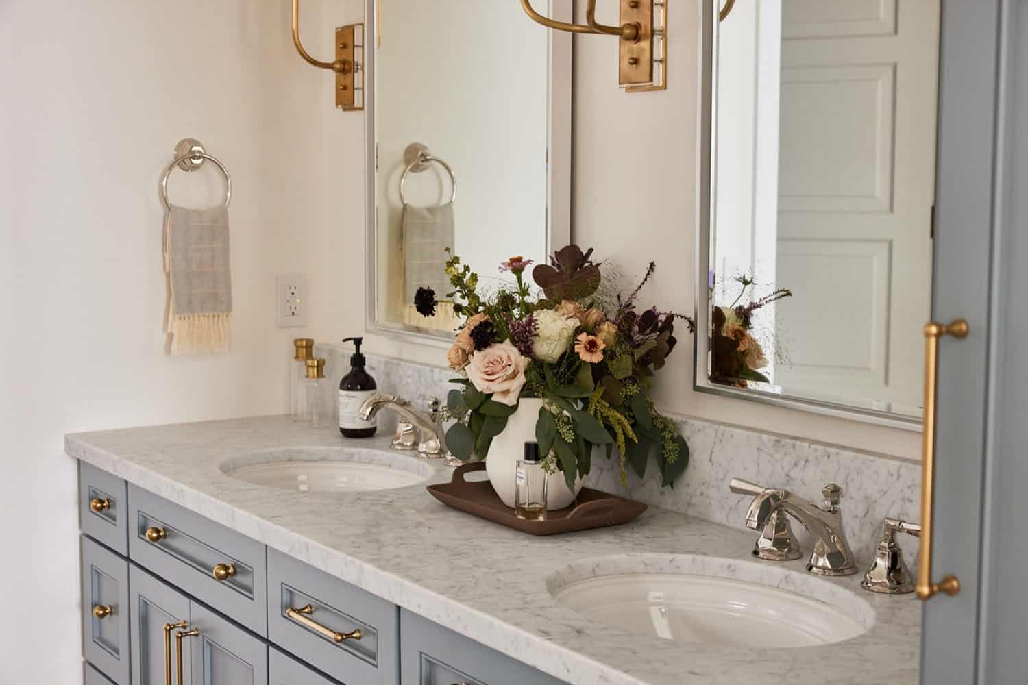 bathroom vanity with a vase on the countertop
