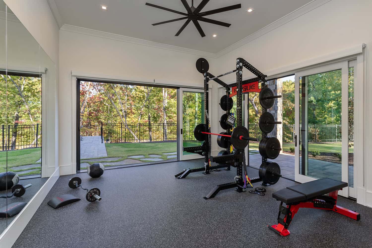contemporary home gym with sliding glass doors