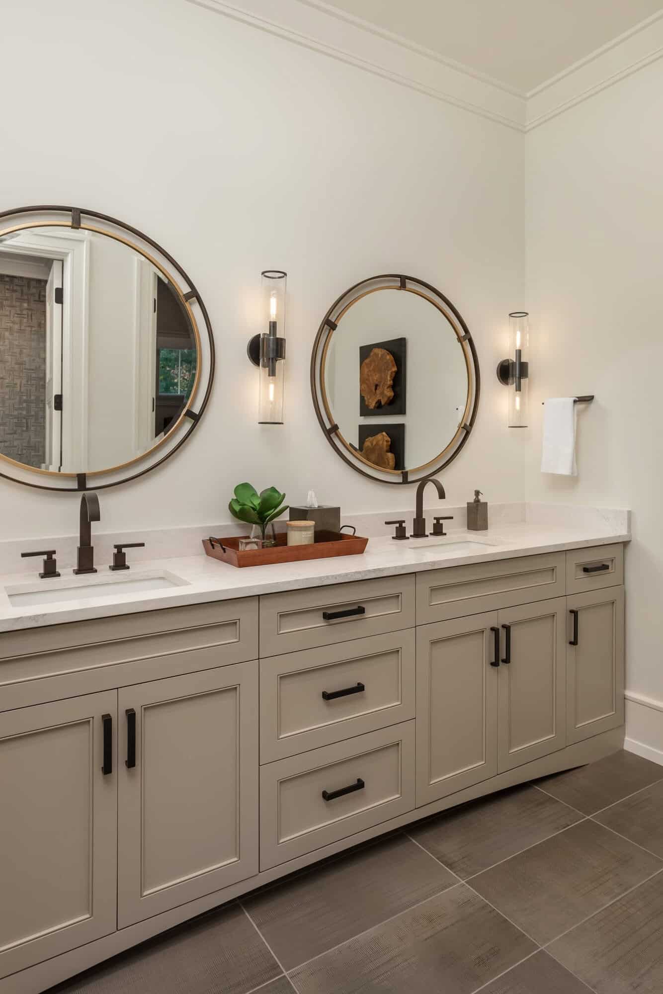 contemporary bathroom vanity with round mirrors