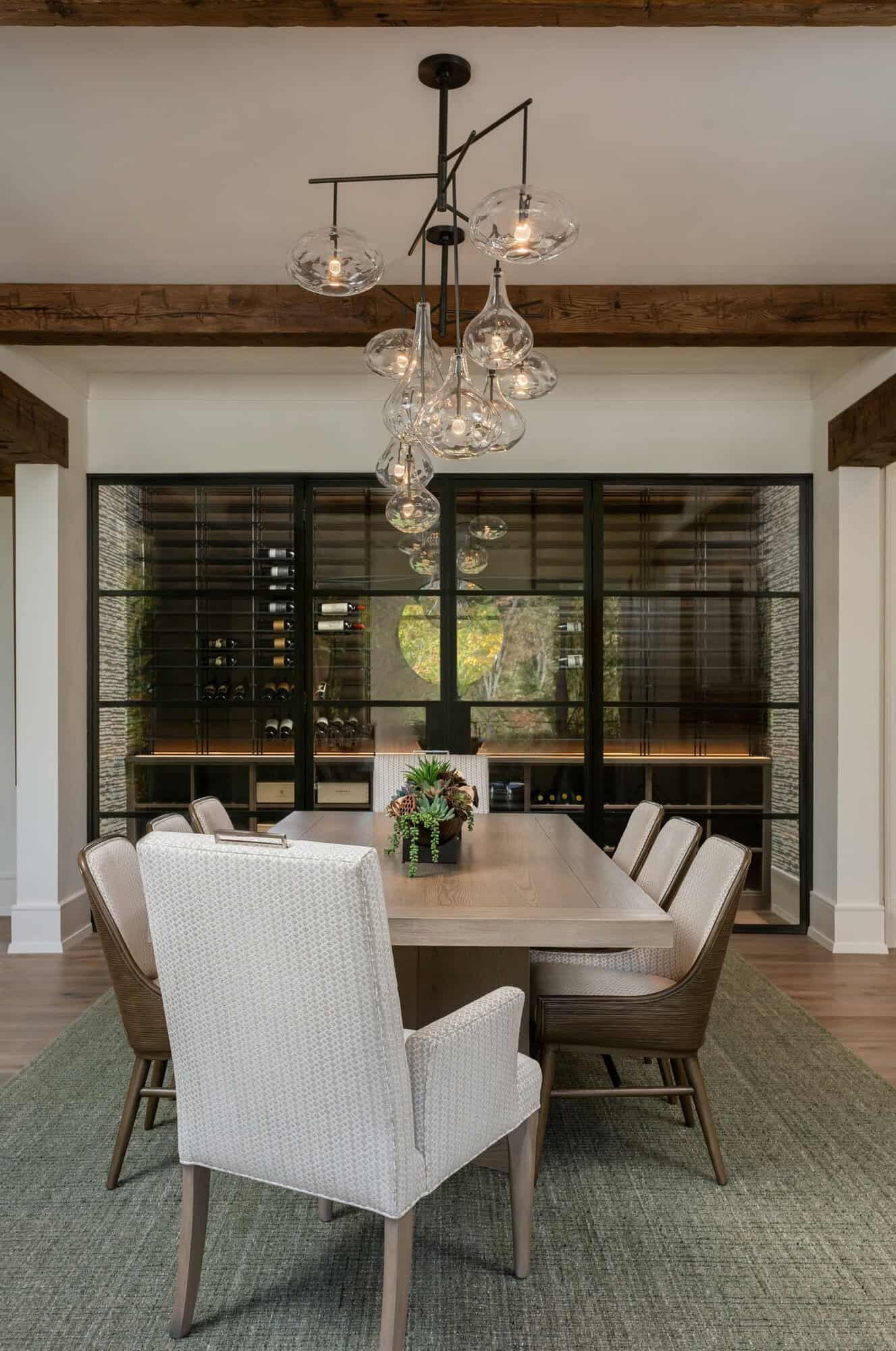 contemporary dining room with a wine cellar