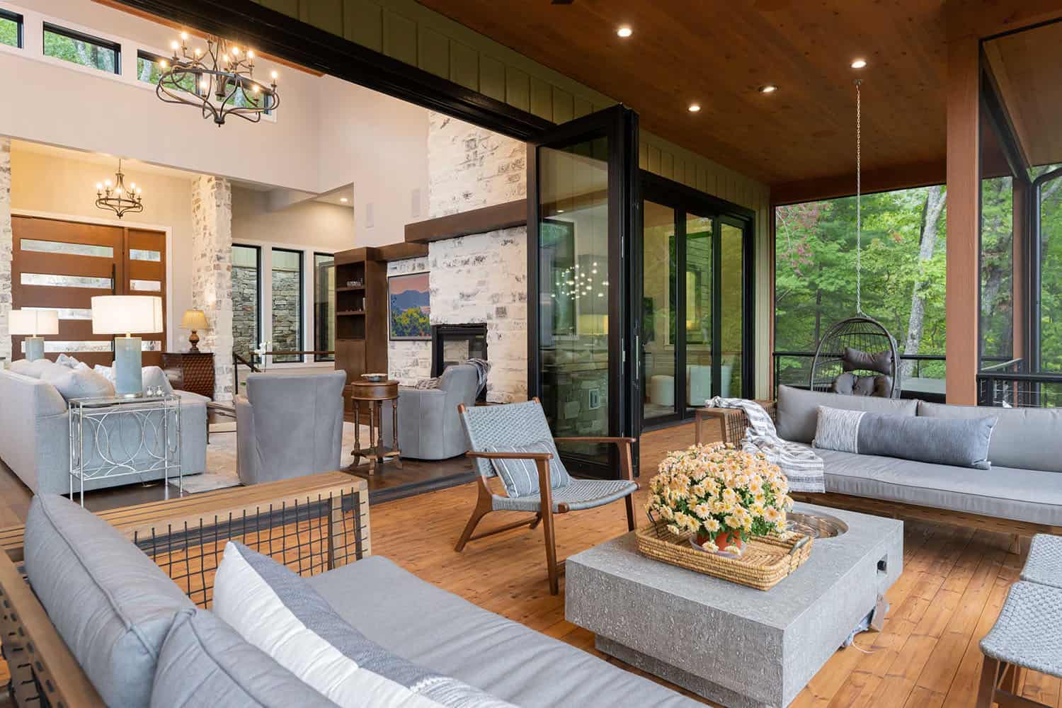 Contemporary screened porch with outdoor furniture