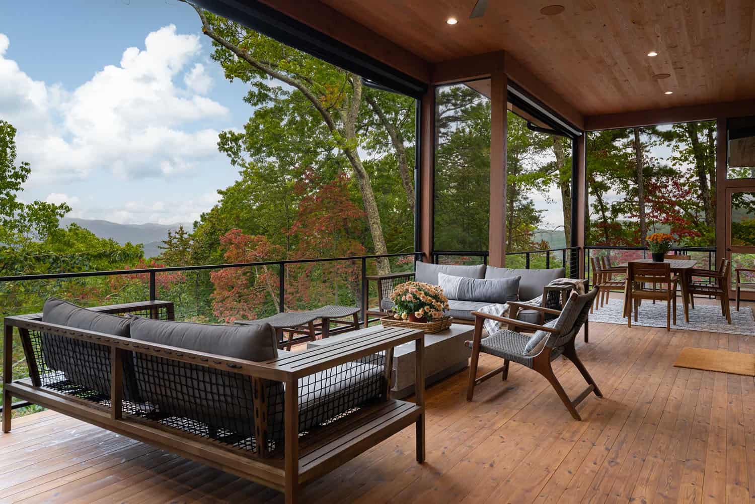 Contemporary screened porch with outdoor furniture