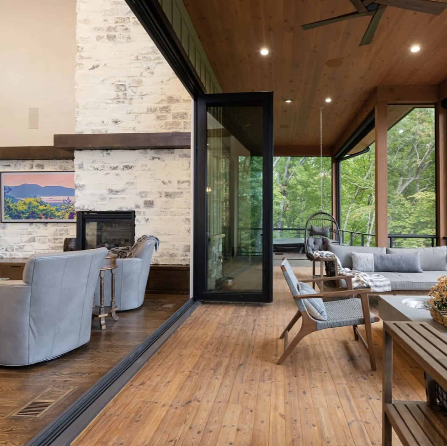 Contemporary screened porch with outdoor furniture