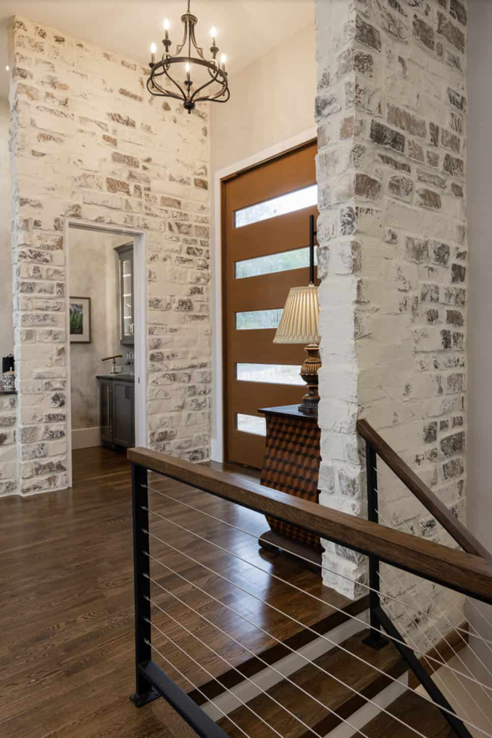 Contemporary mountain home entry with a staircase