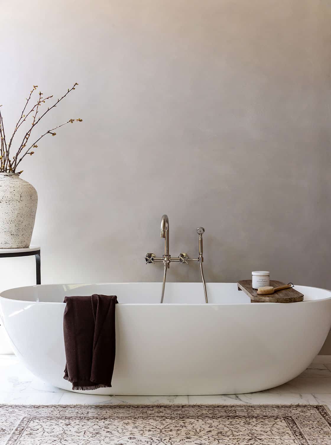 contemporary bathroom with a freestanding tub