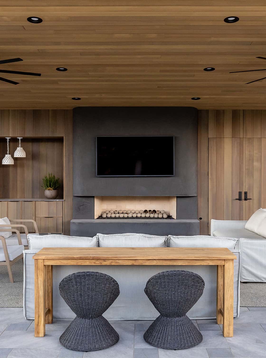 contemporary covered patio with outdoor furniture