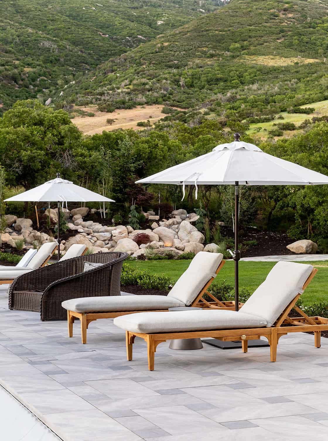 contemporary covered patio with chaise lounges