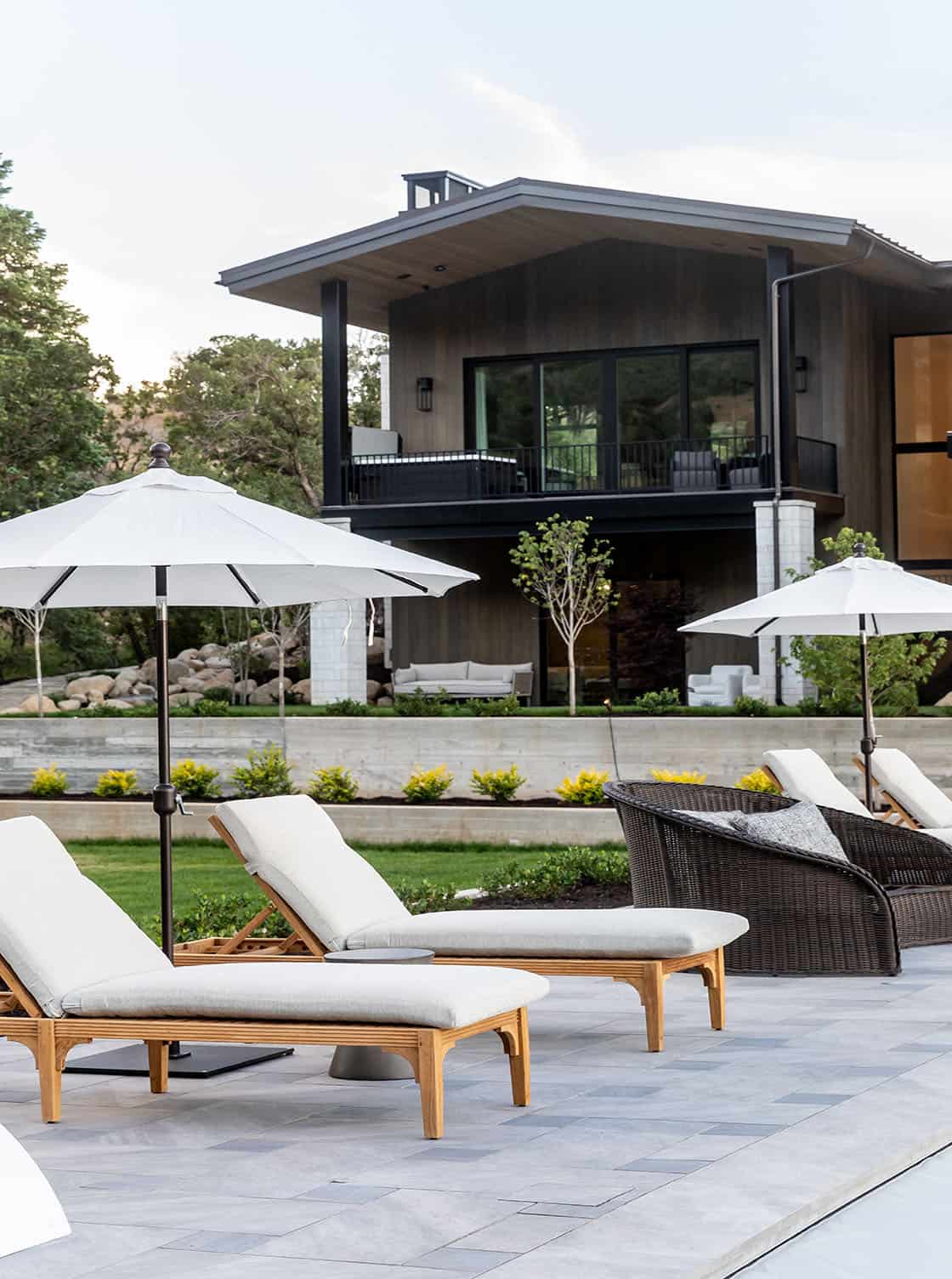 contemporary covered patio with chaise lounges