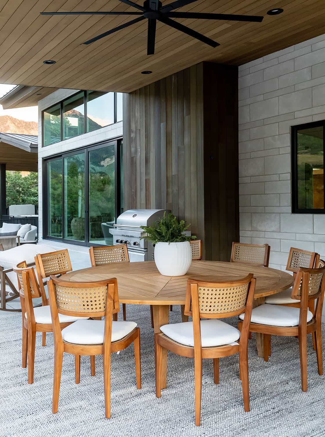 Contemporary covered patio with outdoor furniture