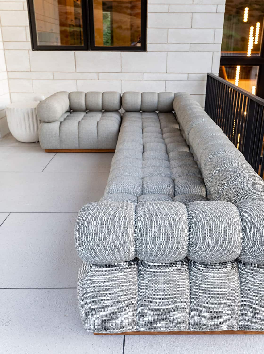 Contemporary covered patio with outdoor furniture