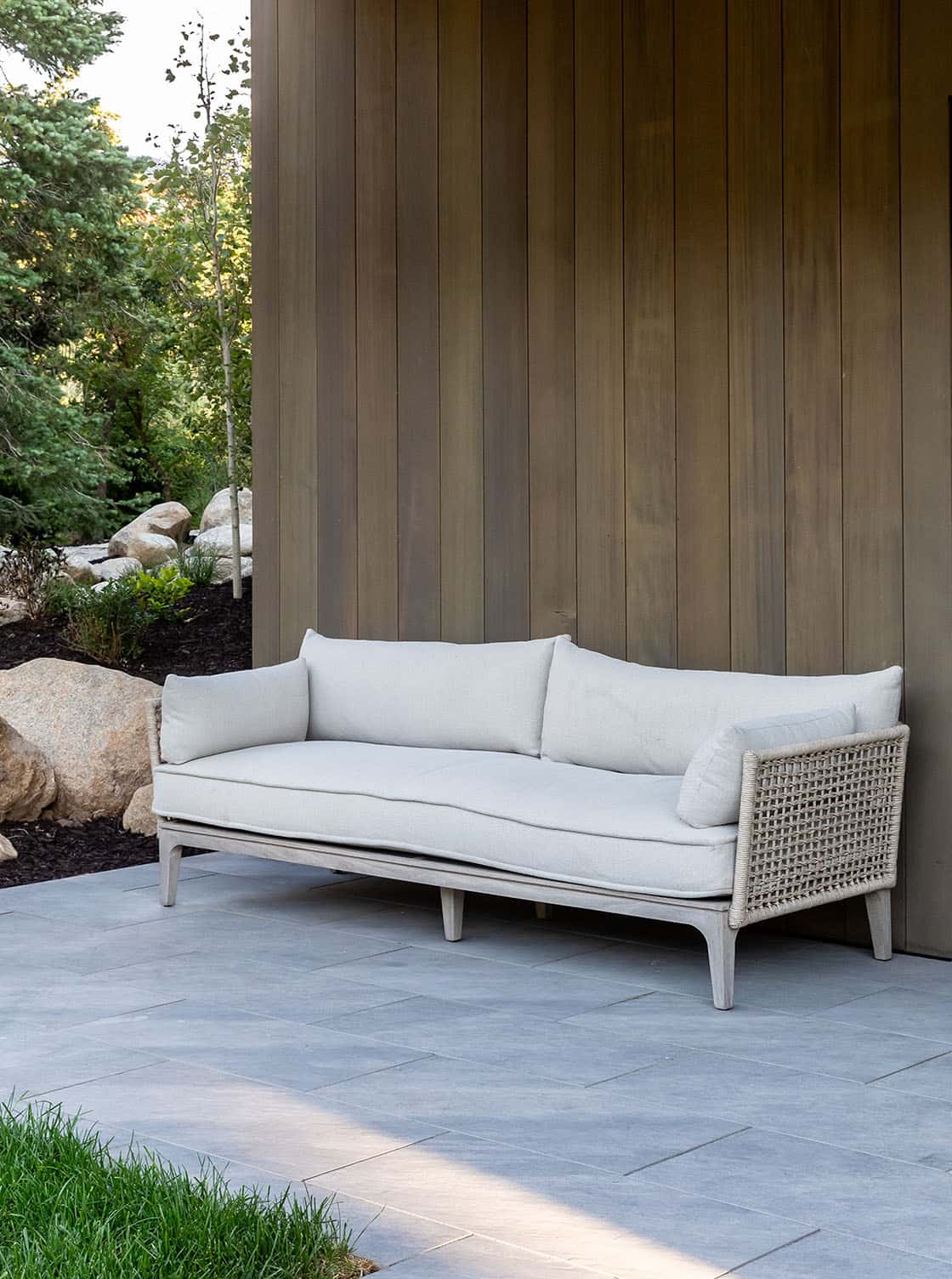 Contemporary covered patio with outdoor furniture