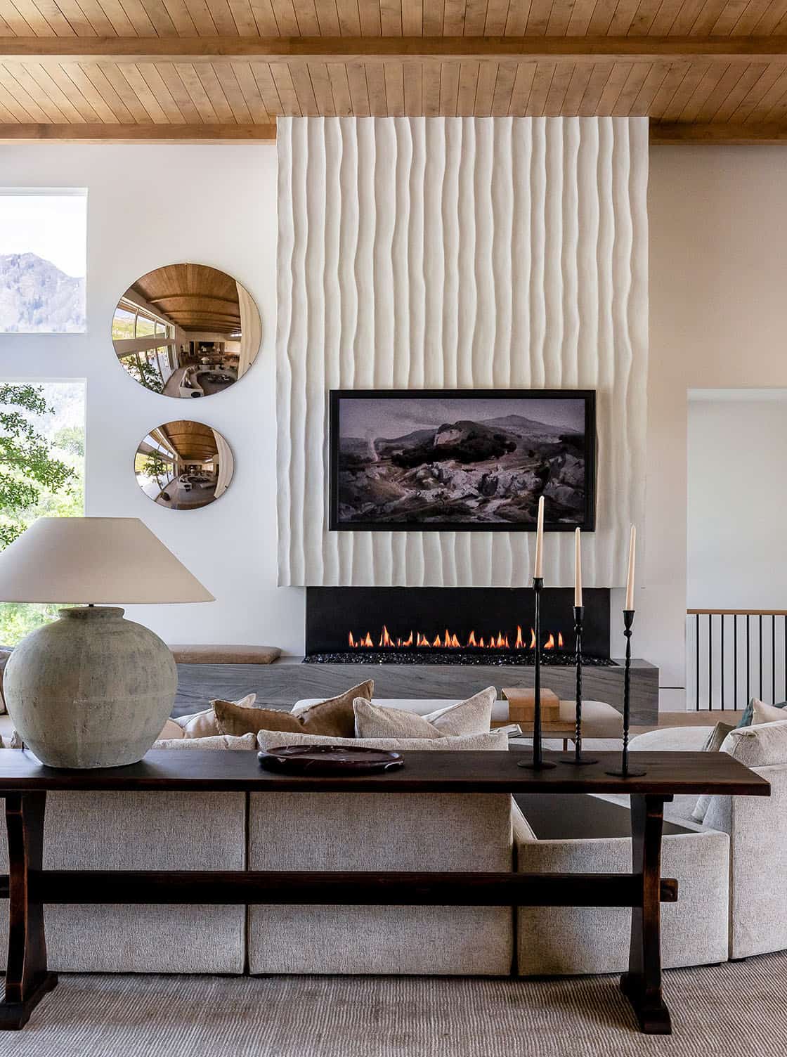 contemporary living room with a fireplace