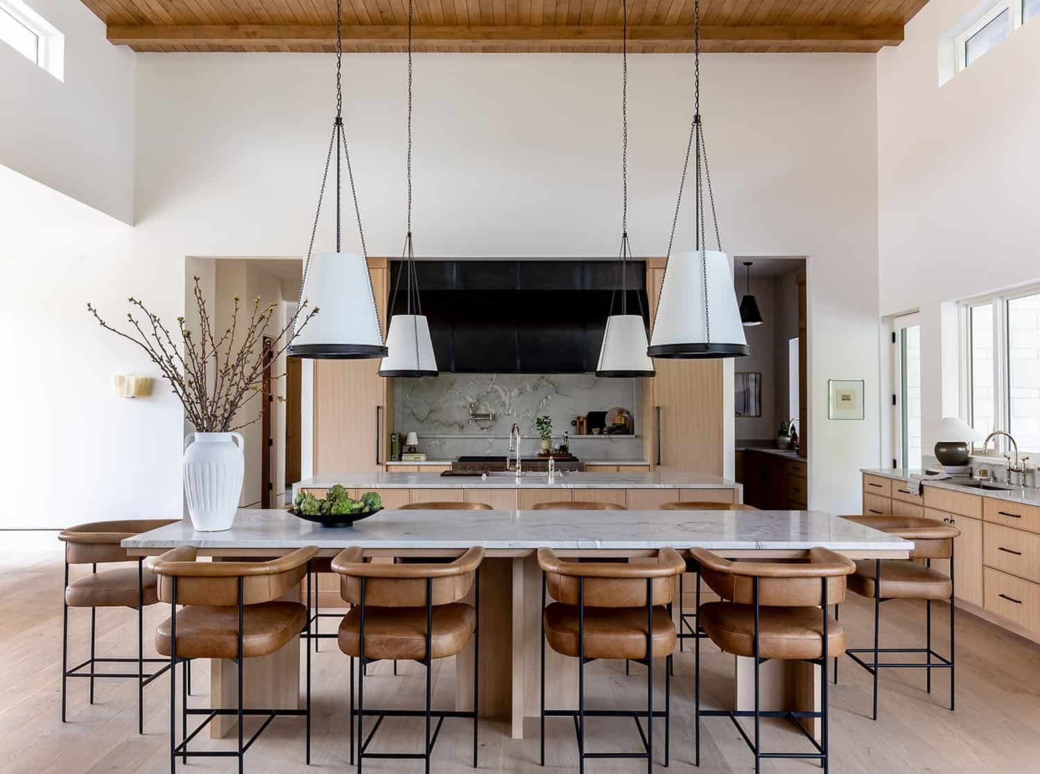 contemporary kitchen with a double island and counter stools