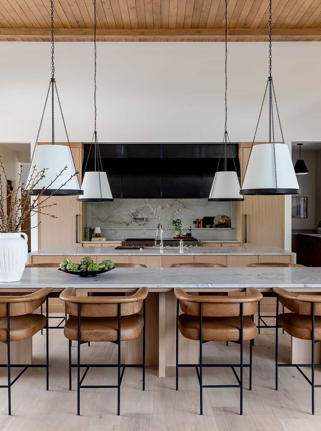 contemporary kitchen with a double island and counter stools