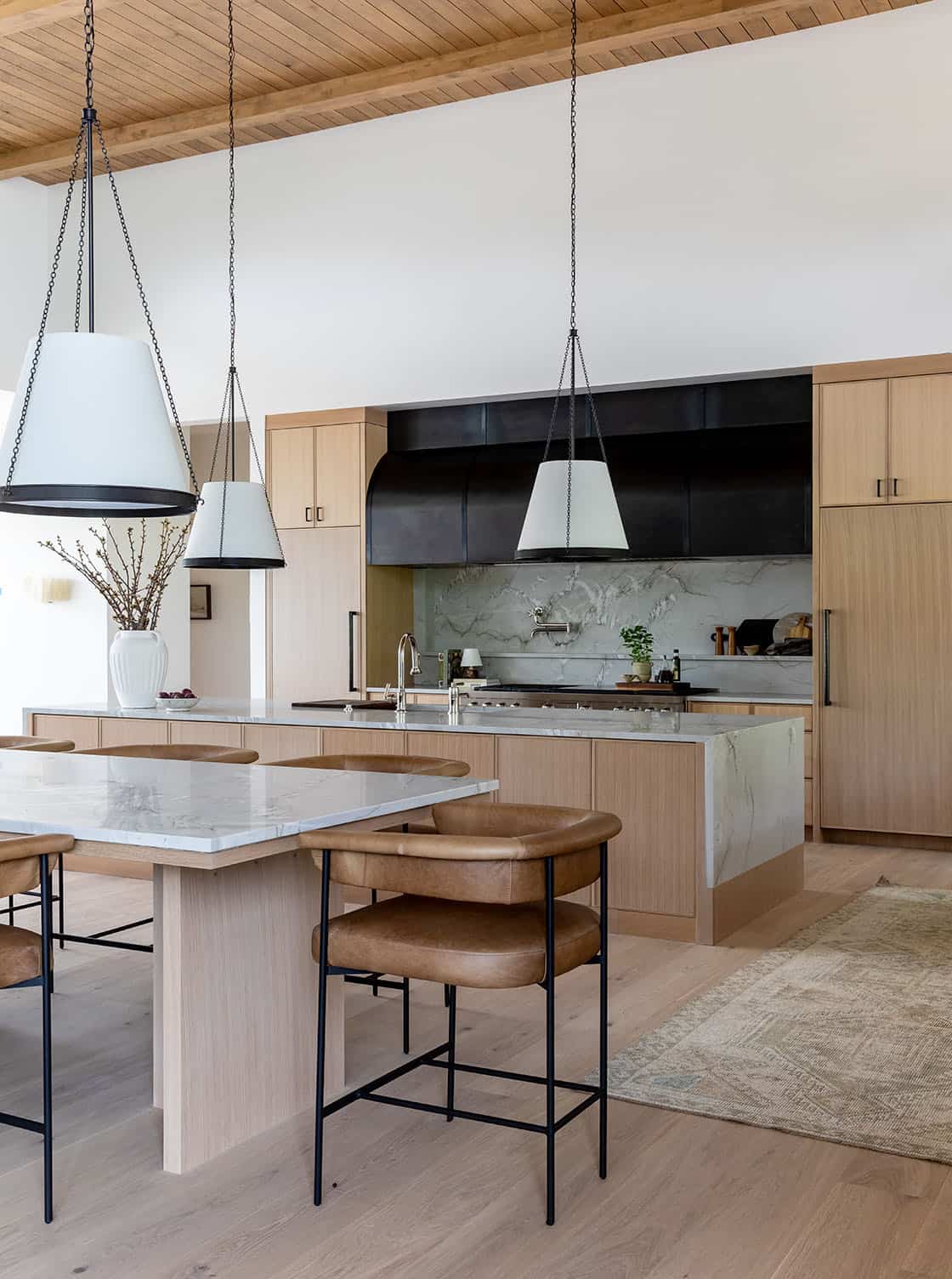 contemporary kitchen with a double island and counter stools