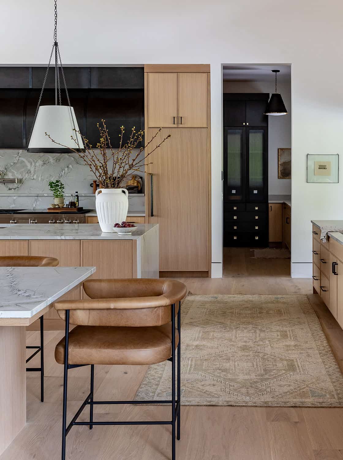 contemporary kitchen with a double island and counter stools