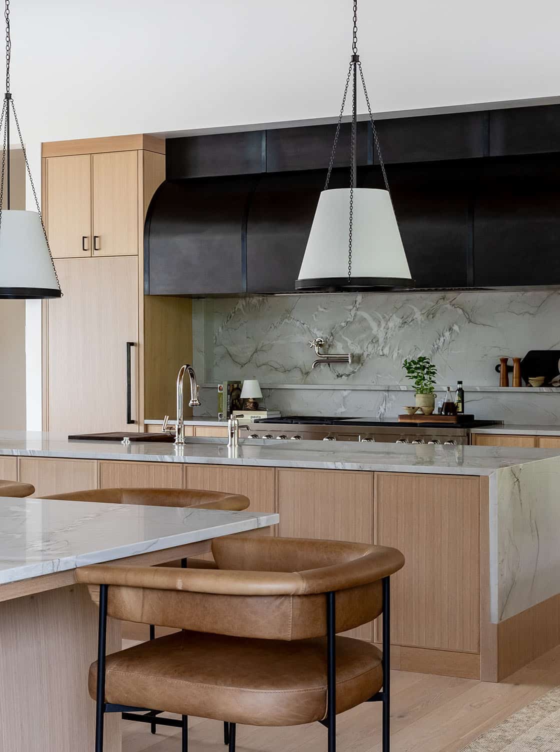 contemporary kitchen with a double island and counter stools
