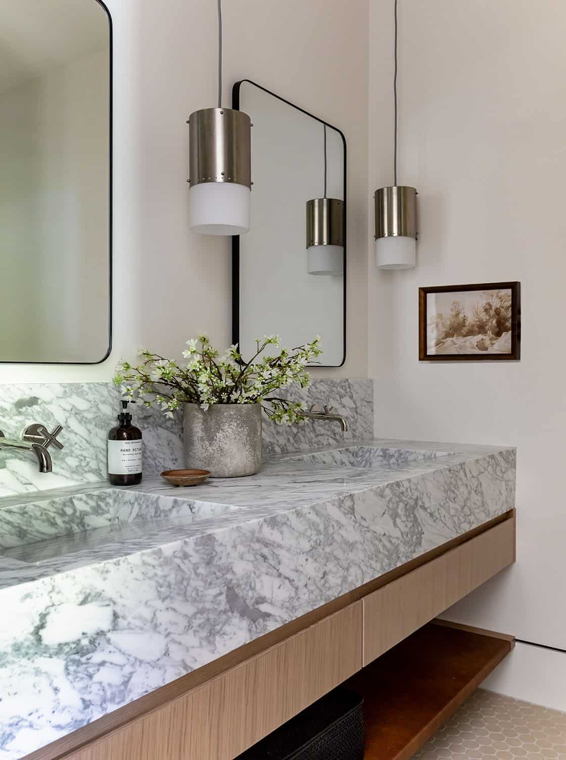 contemporary bathroom with dual sinks and mirrors