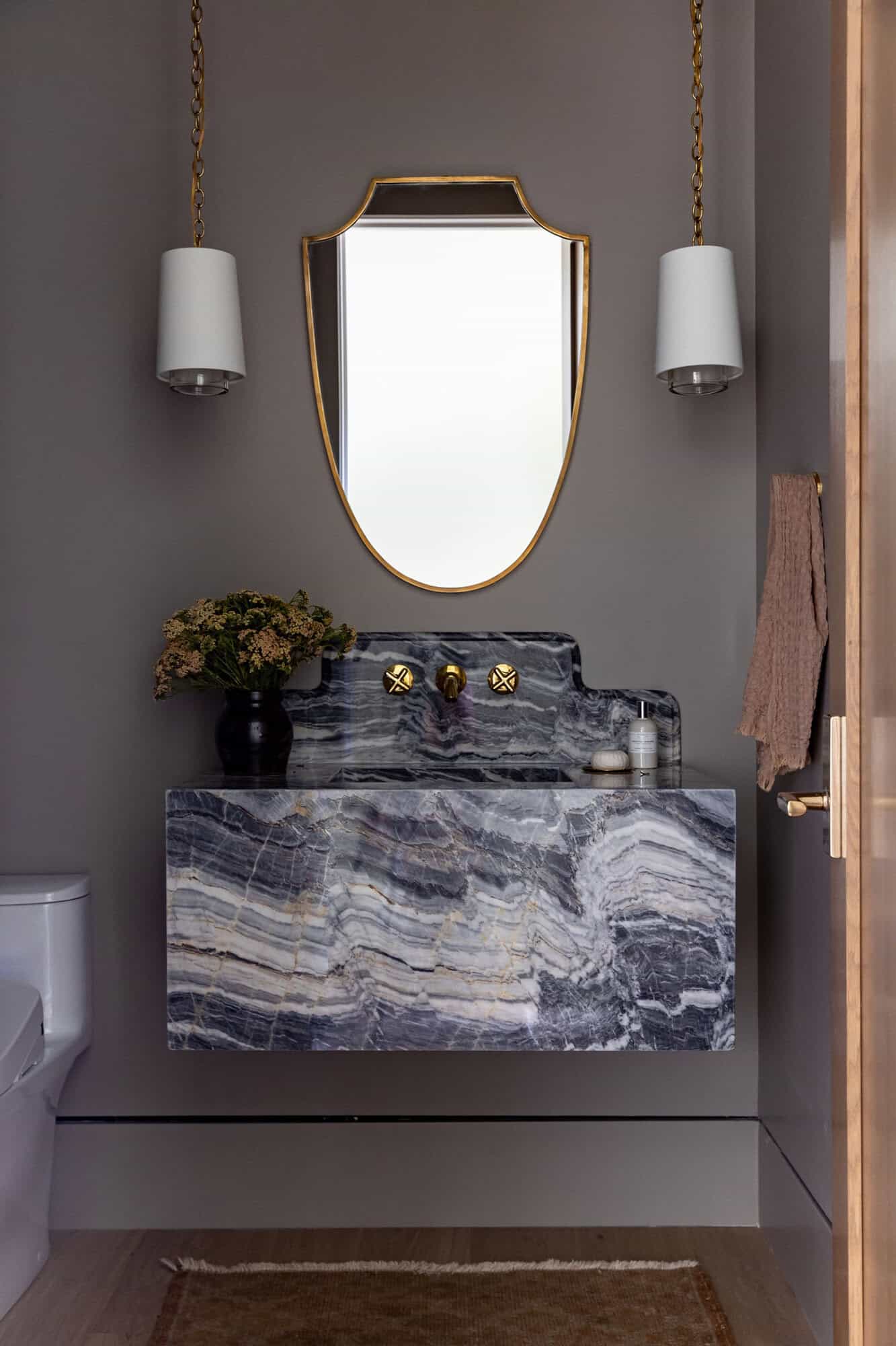 contemporary powder room with a plaster finish