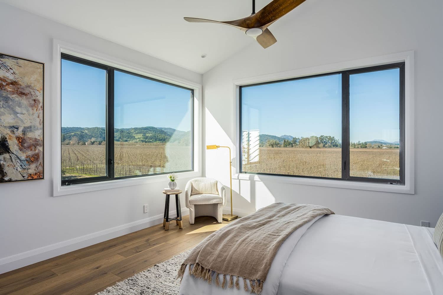 contemporary bedroom with large windows