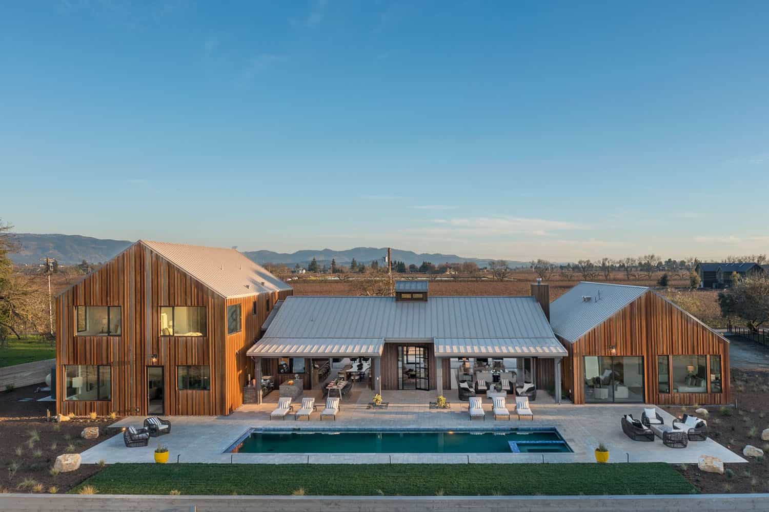 contemporary vineyard home exterior with a pool