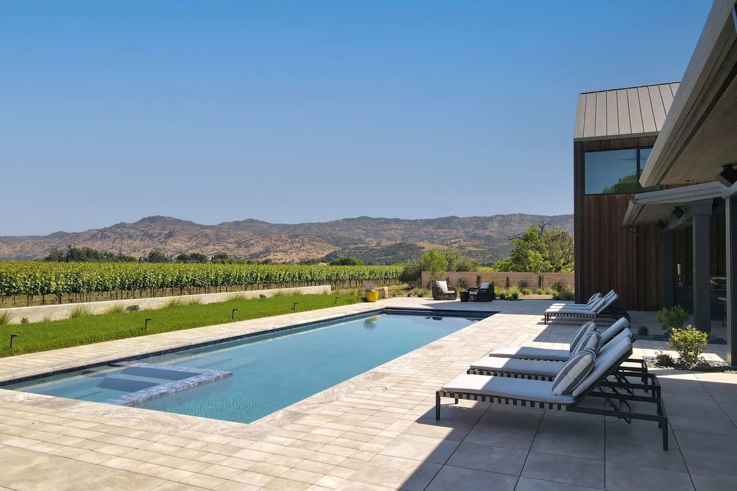 contemporary vineyard home exterior with a pool