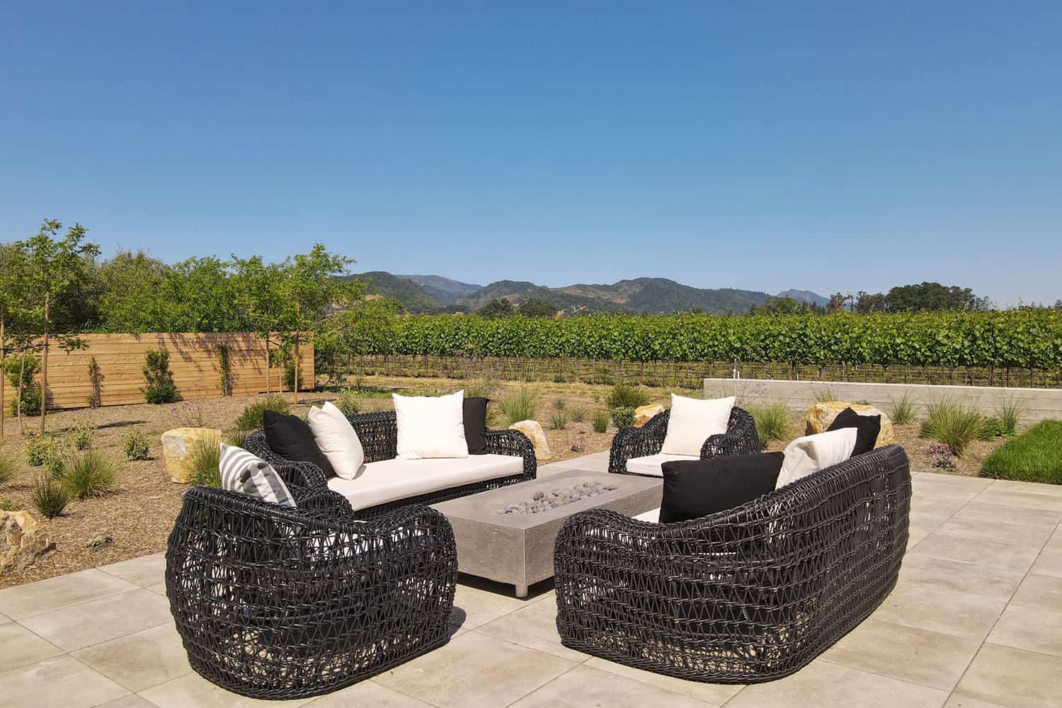 contemporary vineyard home patio with outdoor furniture