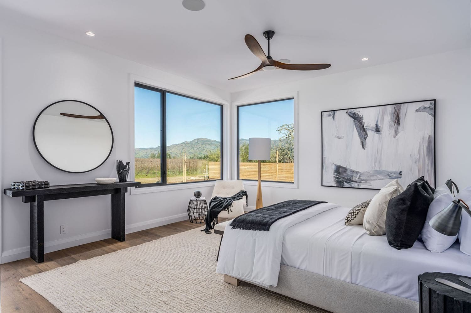contemporary bedroom with large windows