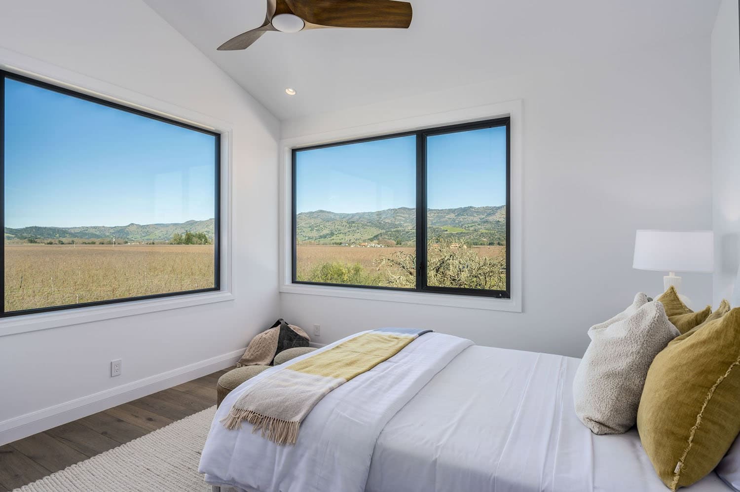 contemporary bedroom with large windows