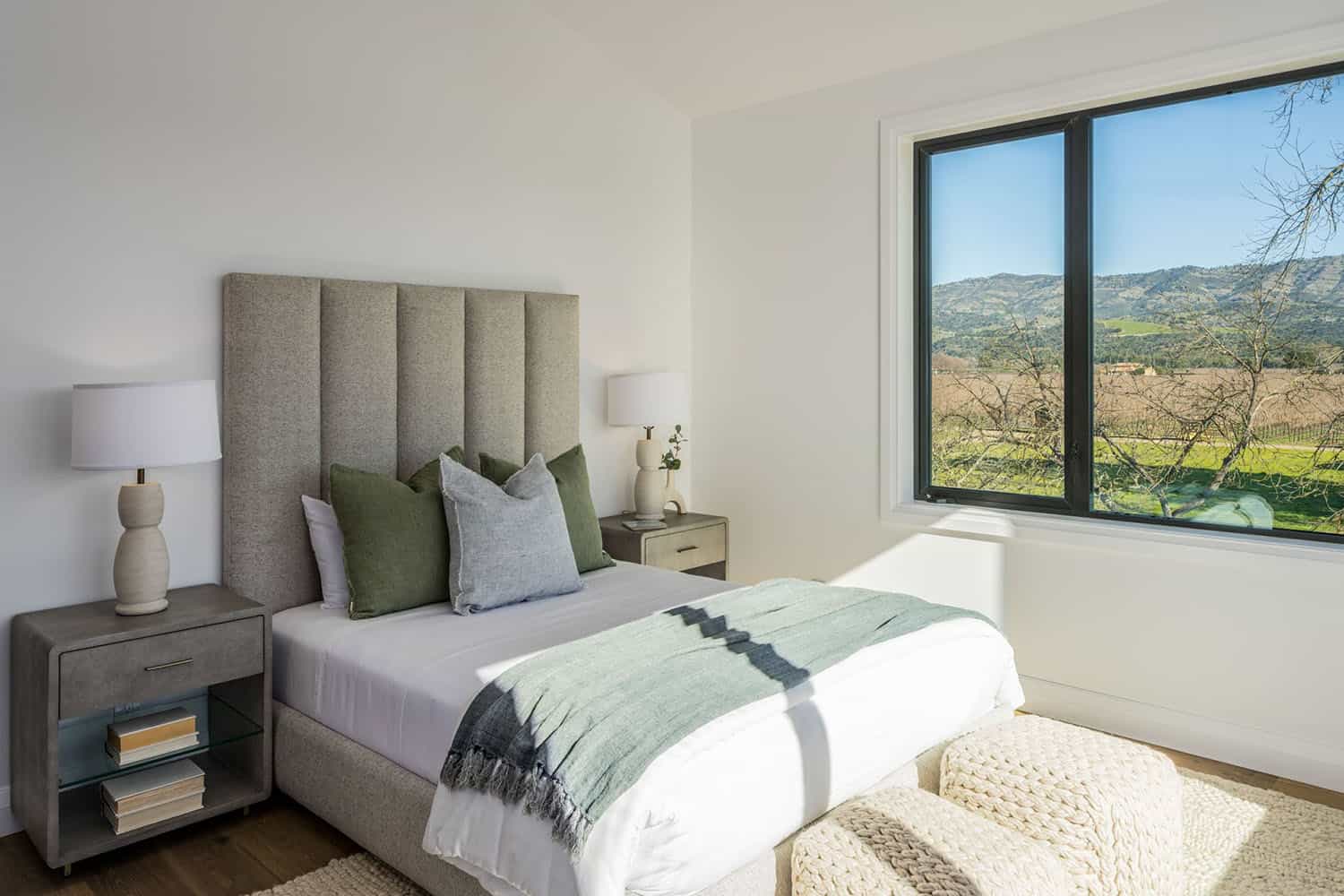 contemporary bedroom with large windows