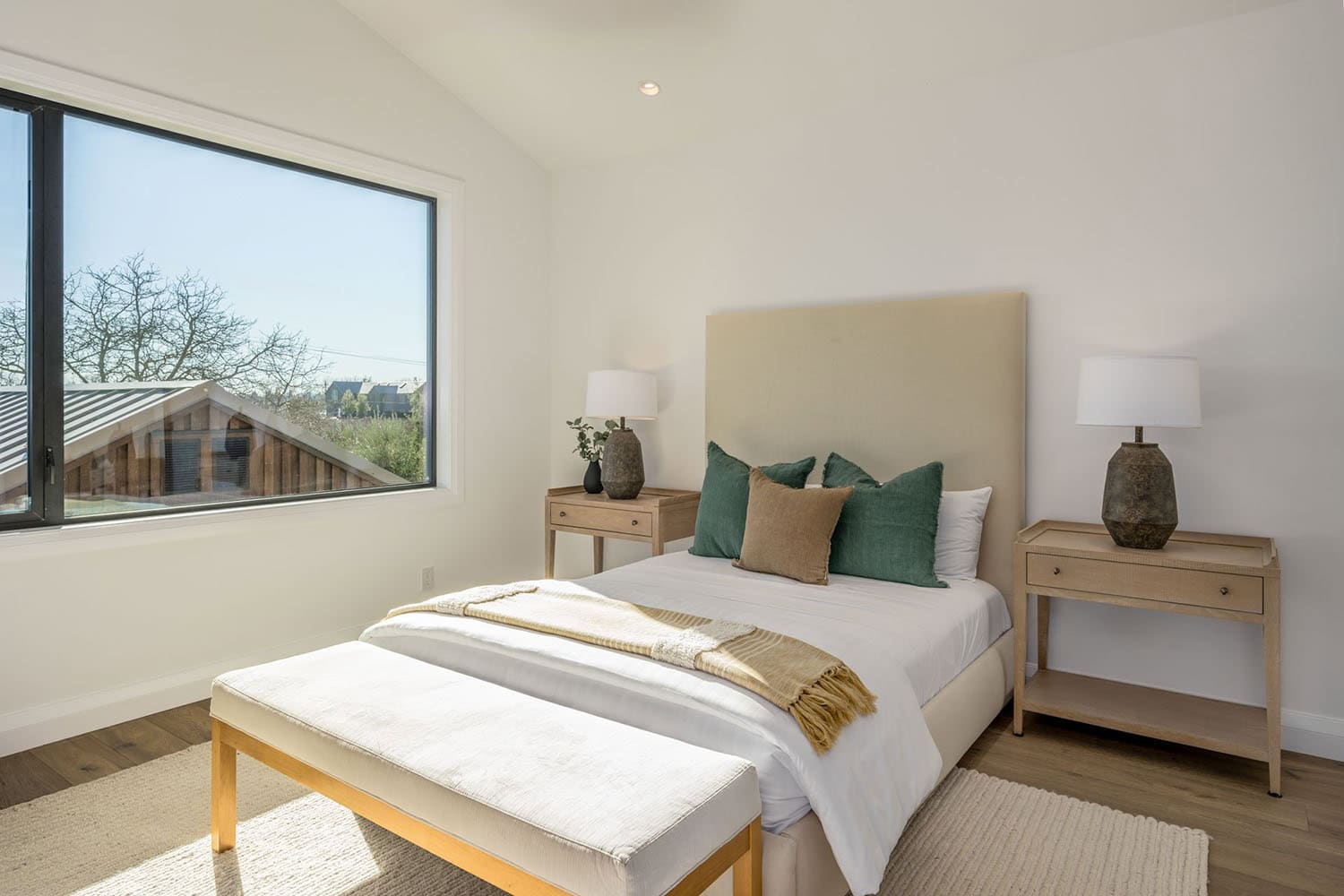 contemporary bedroom with large windows