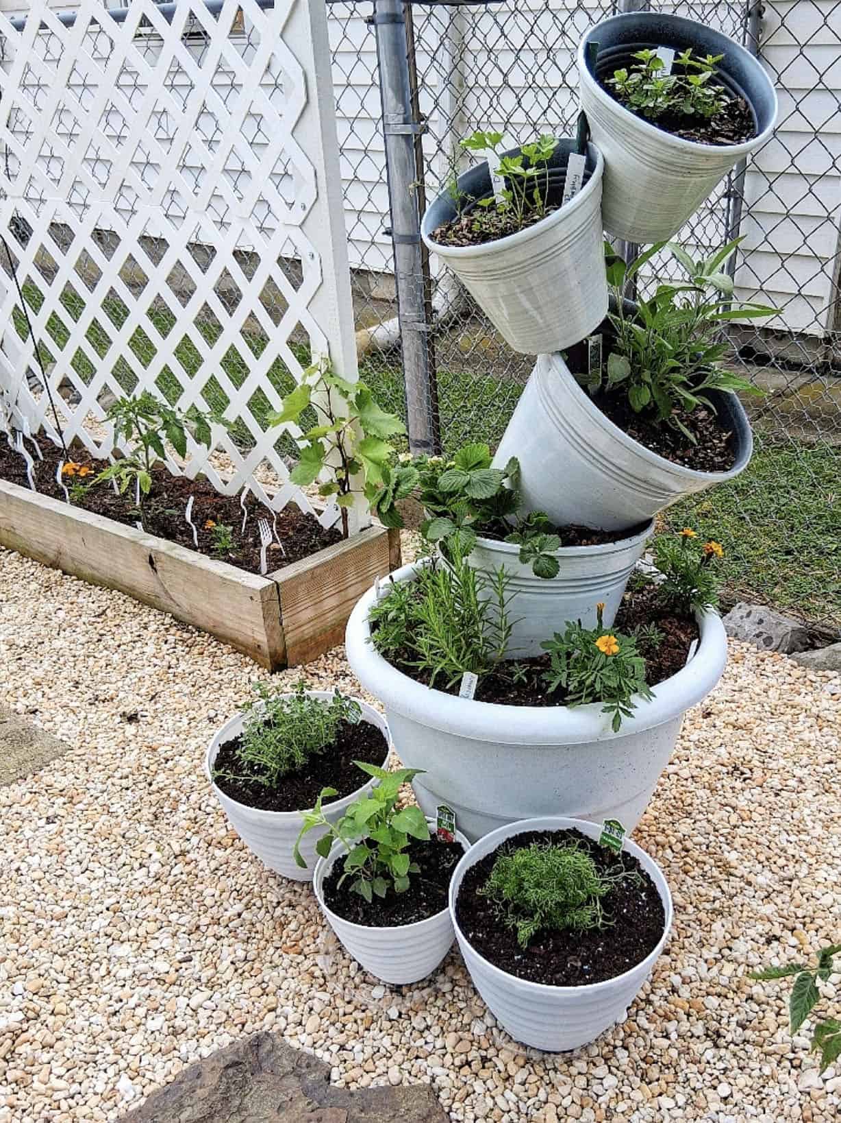 vertical stacked pots herb garden