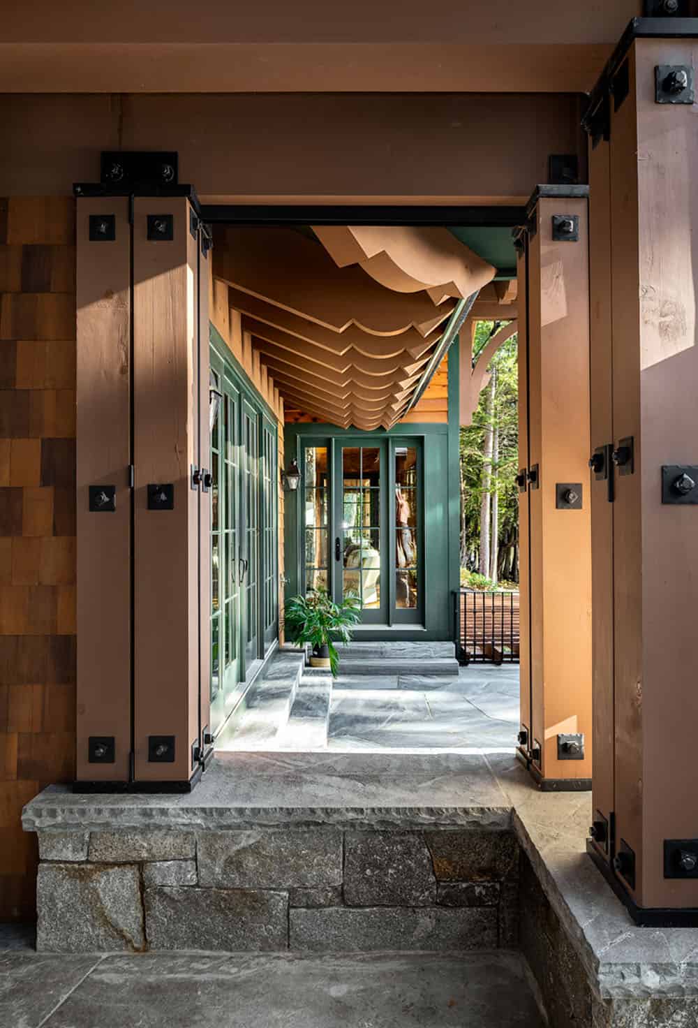 rustic lakae house overed walkway