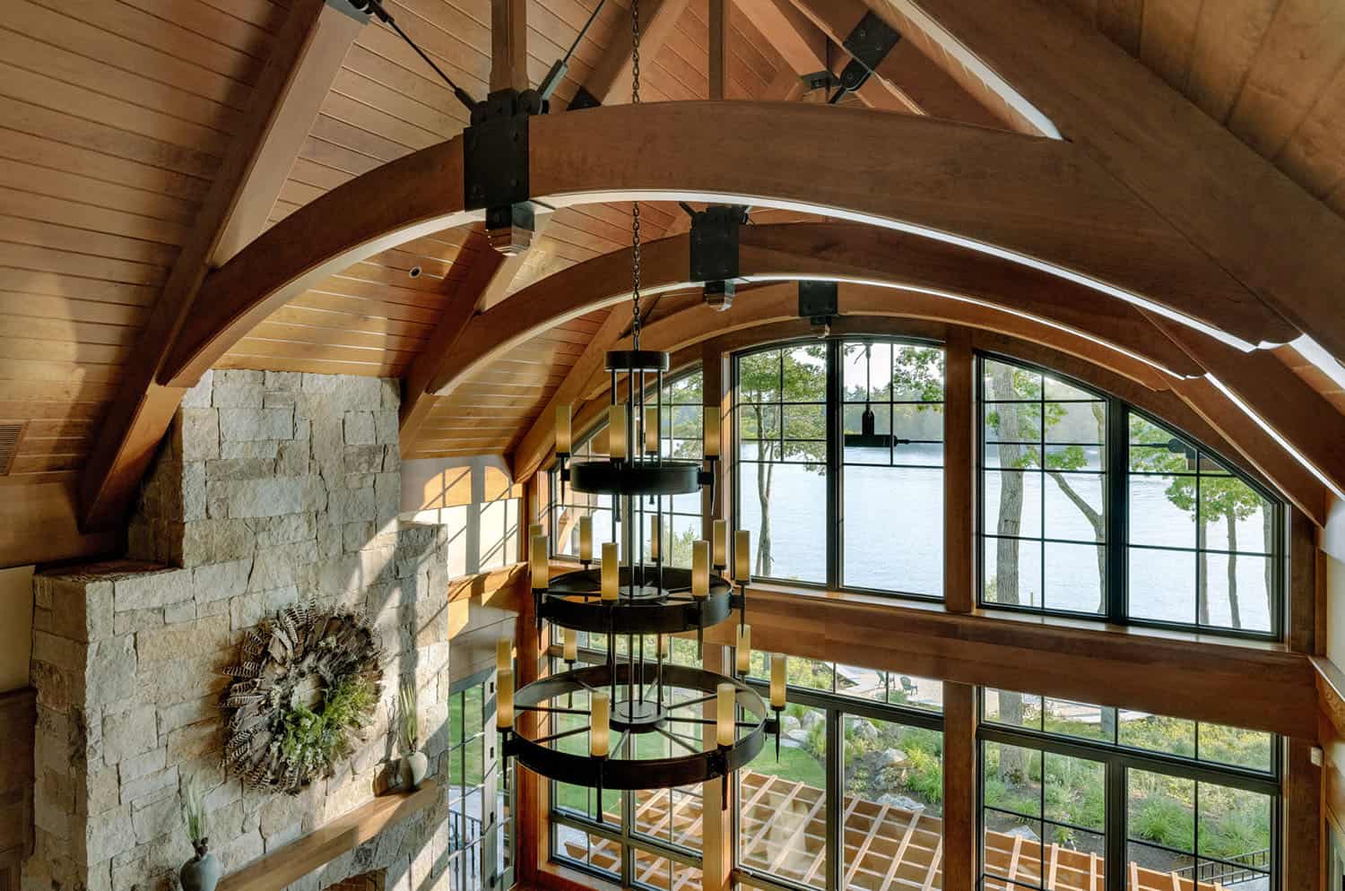 rustic living room with a large chandelier