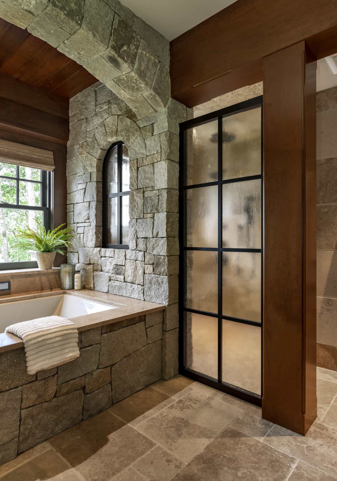 rustic bathroom with an integrated tub