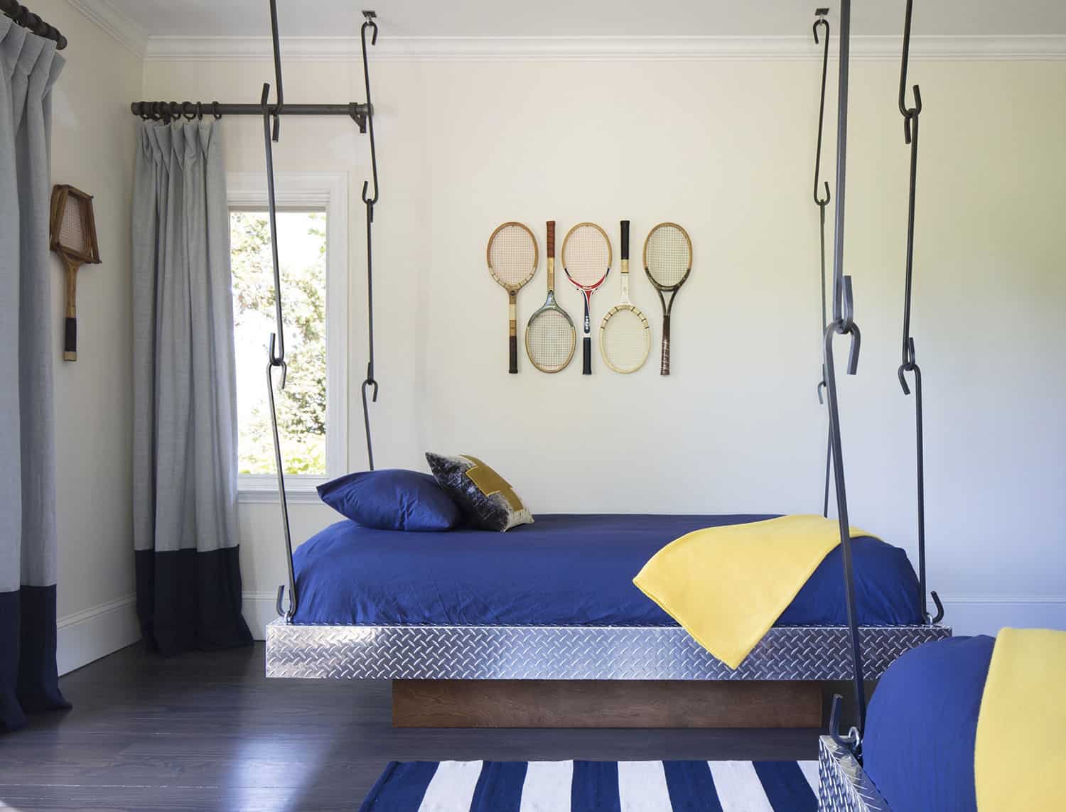 contemporary bedroom with hanging beds