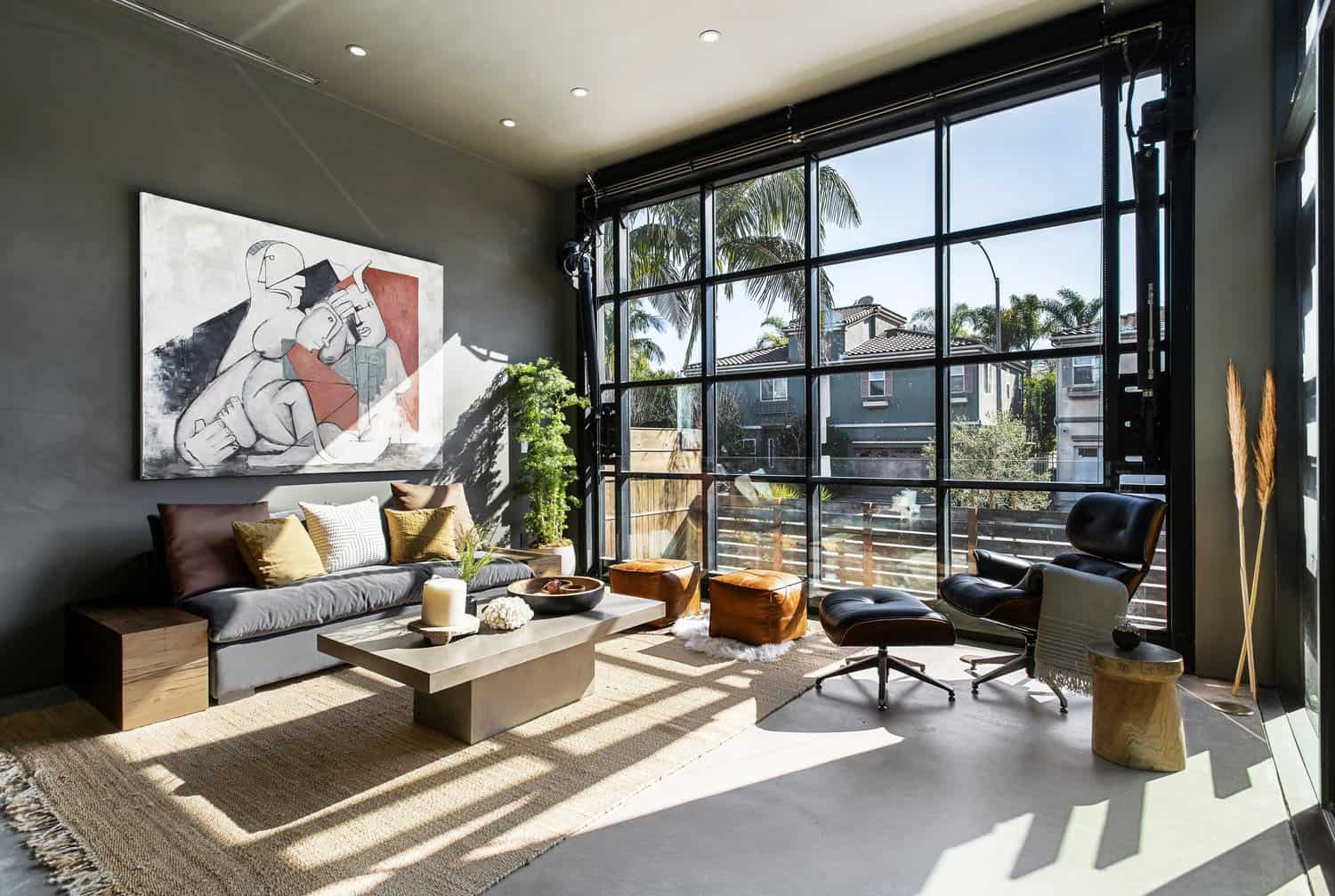 industrial style living room with a hydraulic glass door
